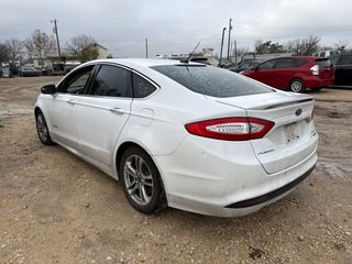2015 Ford Fusion Hybrid Titanium - Exterior Rear Left Corner Image